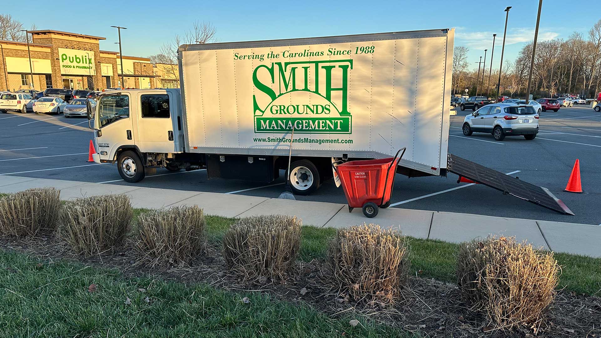 Smith Grounds Management landscaping truck in front of Publix in Charlotte, NC