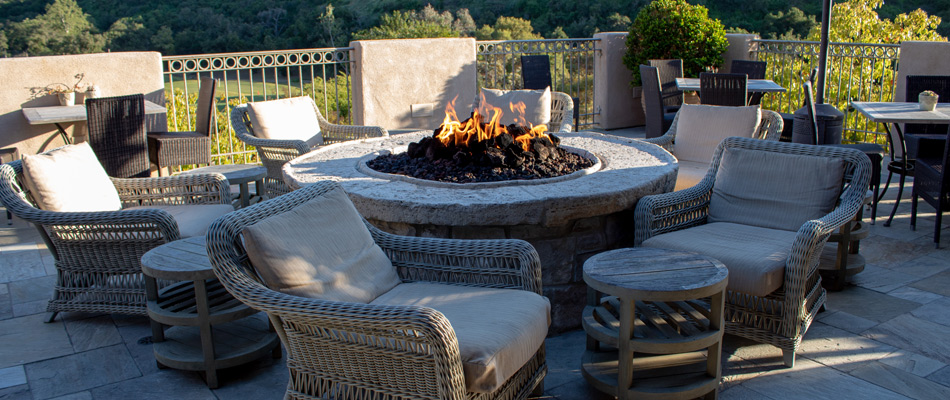 Circular fire pit installed for outdoor living area in Charlotte, NC.