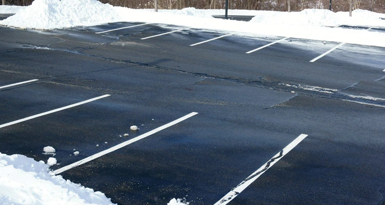 Parking lot after snow plowing services.